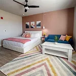 Boho-Luxe Studio - Pink Accents & Mountain Calm